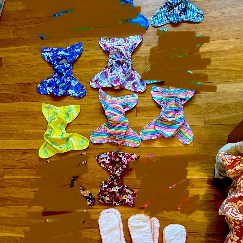 SOLD: Lot of 7 Buttons diaper covers and 10 Buttons inserts